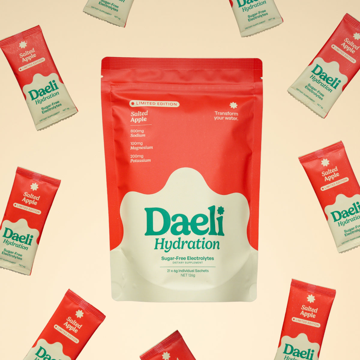 Daeli Hydration Salted Apple electrolyte pouch surrounded by Daeli Salted Apple sachets.